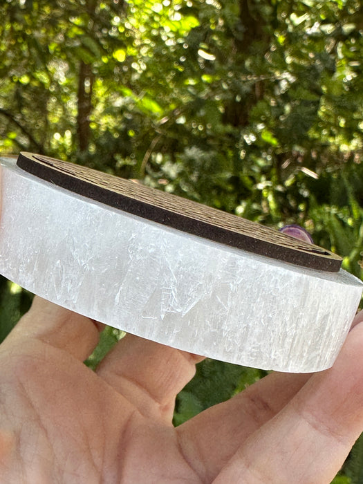 Selenite plate with a laser cut timber Flower of Life symbol