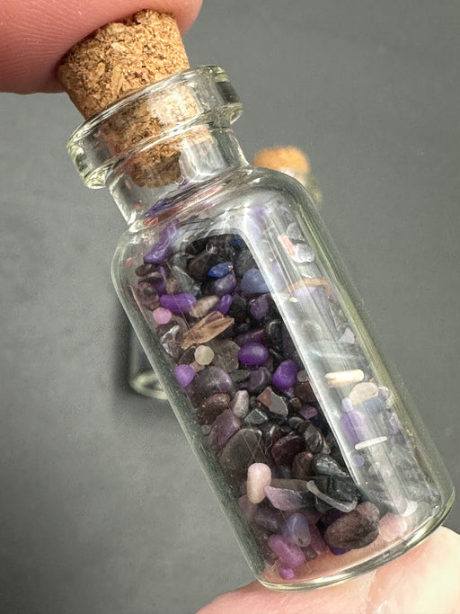 Sugilite Chips in small corked glass bottle