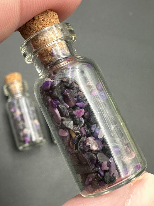 Sugilite Chips in small corked glass bottle