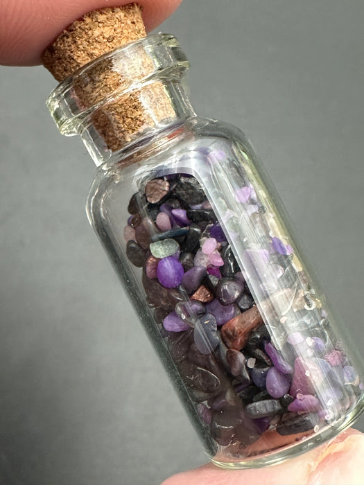 Sugilite Chips in small corked glass bottle