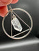 Natural Clear Quartz Point suspended within Silver Plated Inscribed Triangle on Silver Plated Chain
