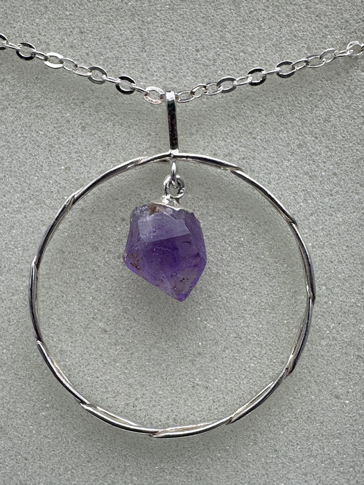 Natural Amethyst Point suspended within Silver Plated Intertwined Circle on Silver Plated Chain