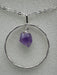 Natural Amethyst Point suspended within Silver Plated Intertwined Circle on Silver Plated Chain