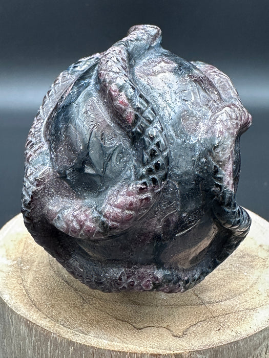 Garnet (Firework) and Astrophyllite Skull with Snake