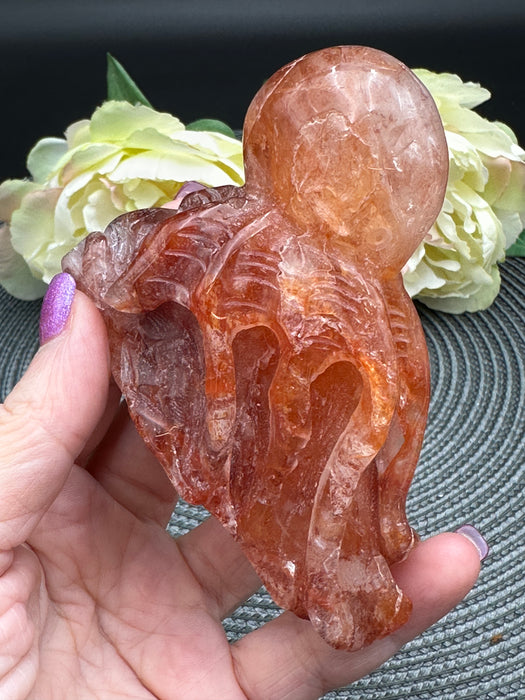 Stunning Fire Quartz Octopus on Rock Carving