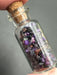 Sugilite Chips in small corked glass bottle